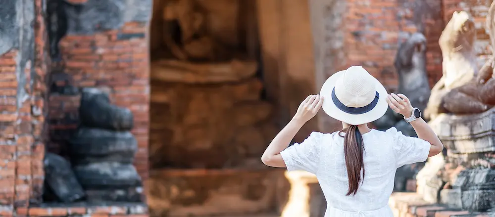 tourist woman in white dress visiting to ancient stupa in 8959195 456